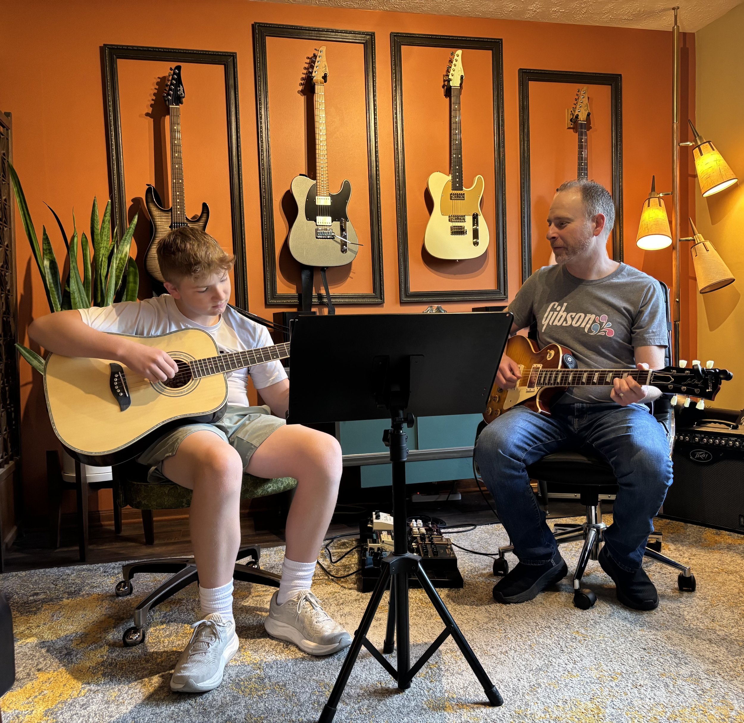 Erik teaching a student in his Omaha studio